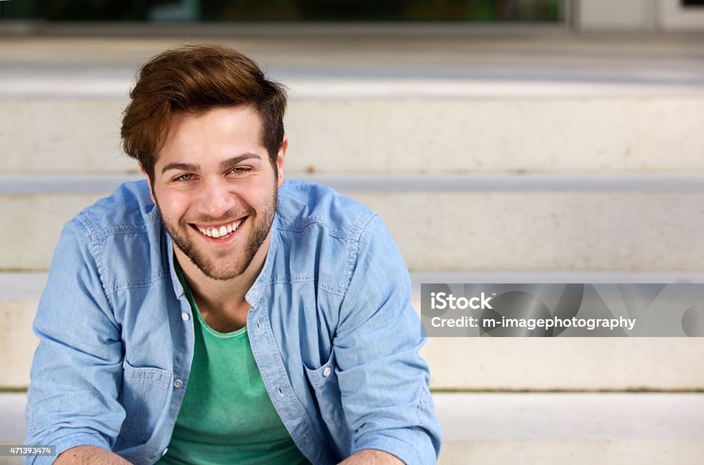 Friendly young man smiling Close up portrait of a friendly young man smiling 20-24 Years Stock Photo