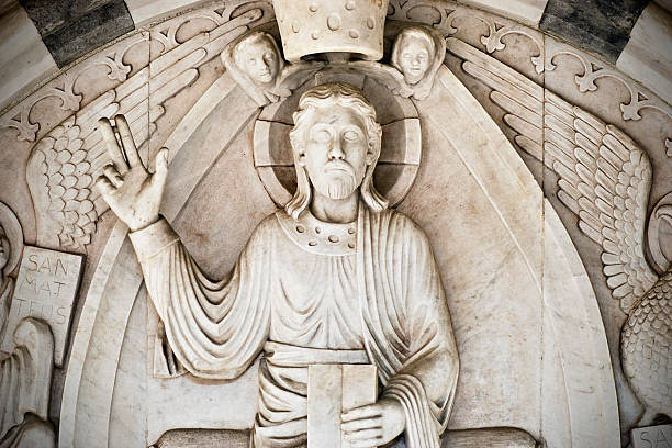 istock Antique cemetery statue close up 471393575