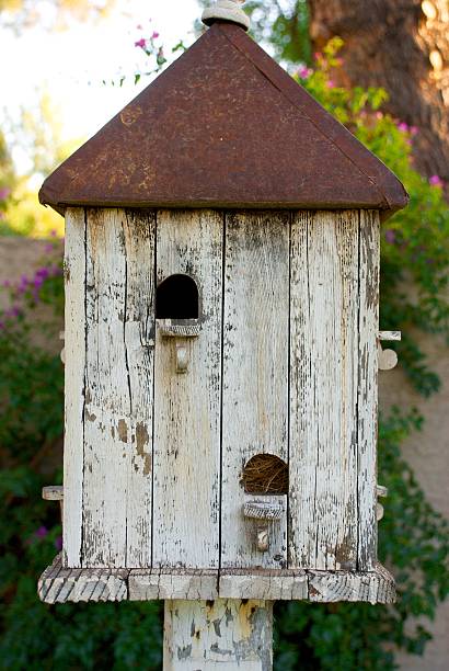 istock White Birdhouse with Rusted Roof 471393873