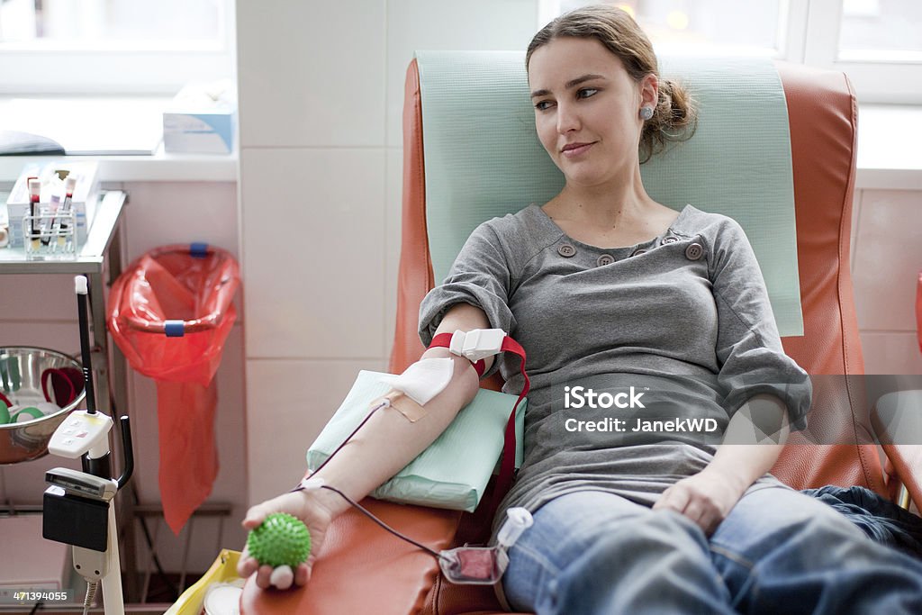 blood donation - beautiful girl in the clinic Blood Donation Stock Photo