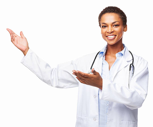 Happy African American Female Doctor Presenting Something - Isolated stock photo