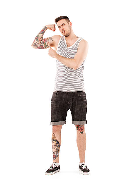 istock Young Man Showing His Tattoo 471394369