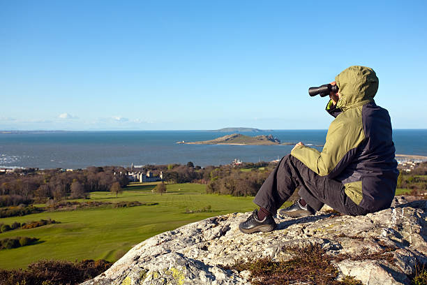 istock Relaxing on the top of a mountain peak 471396089