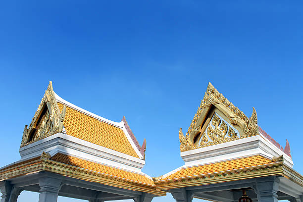 Top part of Thai gold color style architecture in temple stock photo