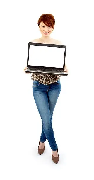 Photo of Slim woman holding laptop with blank screen on white