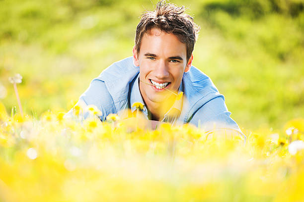 istock Beautiful young man in nature. 471400289