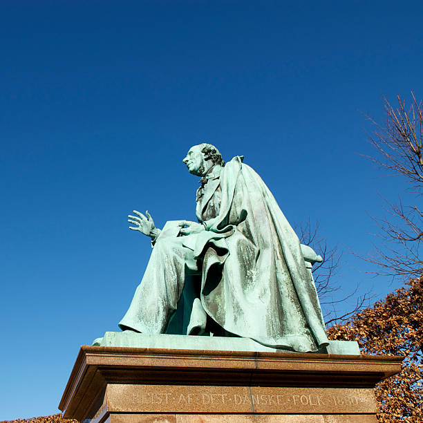 Fairy Tale Author Statue of the famous author Hans Christian Andersen (1805-1875), Kongens Have, Copenhagen, Denmark. hans christian andersen stock pictures, royalty-free photos & images