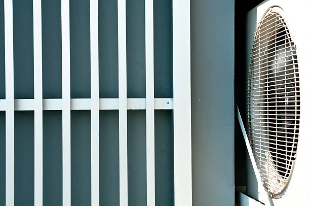 istock Outdoor compresser and metal wall 471400547