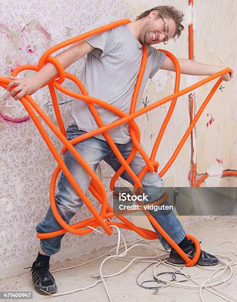 Inexperienced Electrical Engineer Stock Photo - Download Image Now - Humor, Problems, Construction Industry