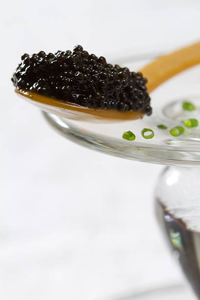 Caviar on spoon stock photo