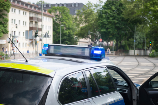 German Polizei police vehicle with siren lights flashing