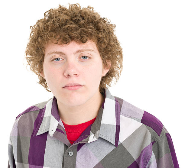 istock Serious Teenage Boy Staring At Camera 471403783