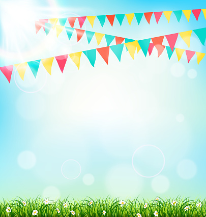 Celebration background with buntings grass and sunlight on sky background