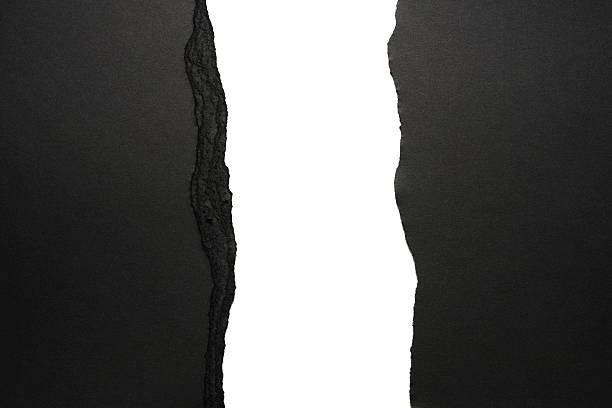 Isolated shot of black torn paper border on white background Black torn paper border isolated on white background. cut or torn paper paper torn message pad stock pictures, royalty-free photos & images