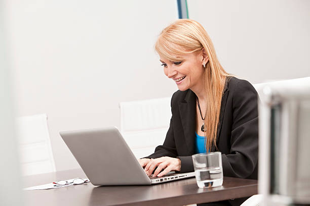 istock Businesswoman Working on Laptop 471405361