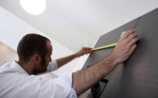istock Measuring kitchen furniture 471406359