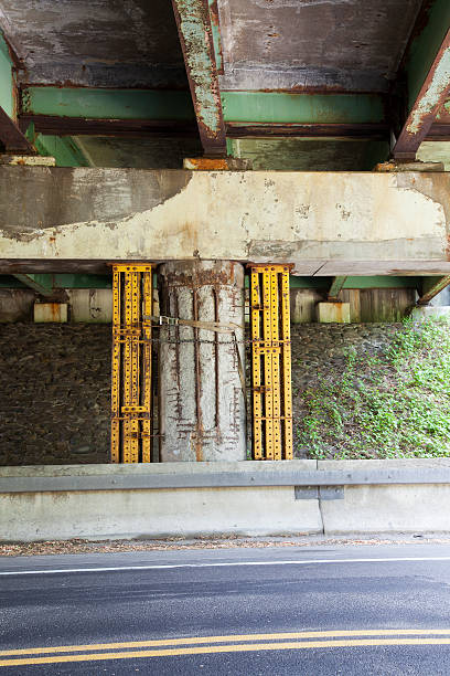 istock Deteriorating Bridge Support Pillar with Metal Shoring Vertical 471407361