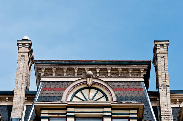 istock old building architecture chimneys wood paint brick sky roof shingles 471408329