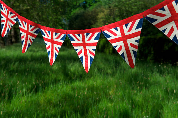 istock Jubilee Bunting Union Jack Flag Green Background 471409913