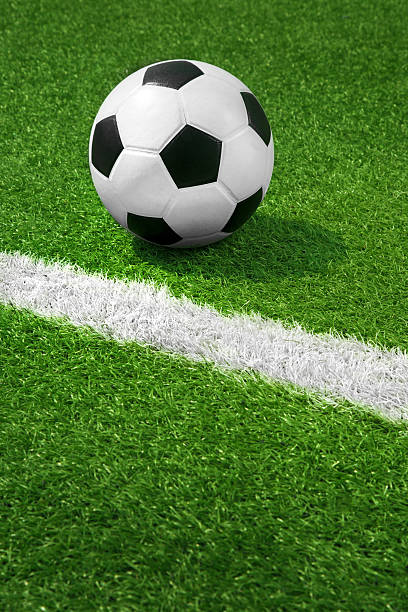 istock soccer ball on field 471411893