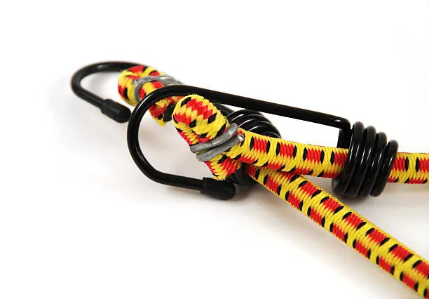 Stock pictures of bungee cords with steel hooks of several colors