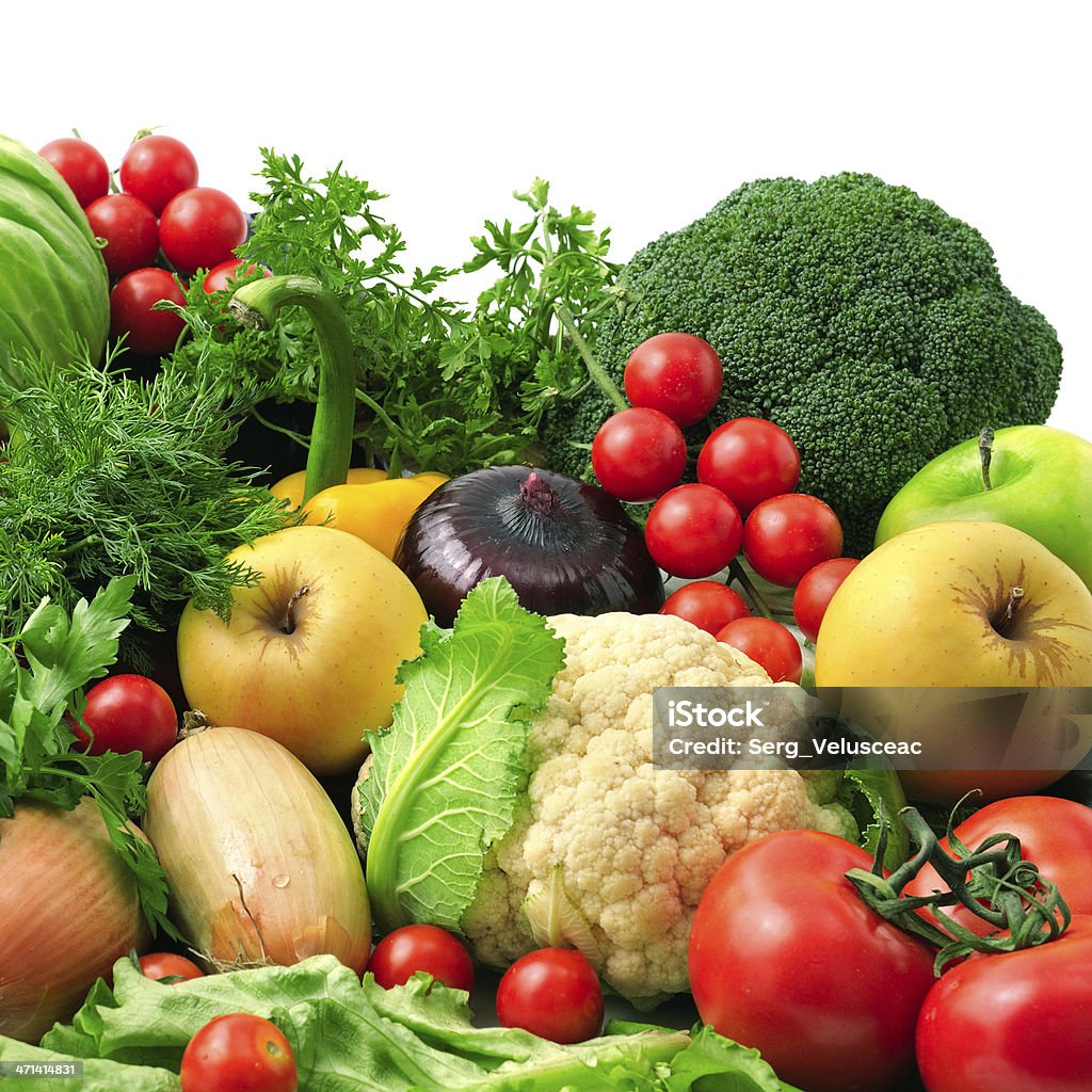 Fresh and vibrant fruits and vegetables in a pile fresh fruits and vegetables isolated on white background Agriculture Stock Photo