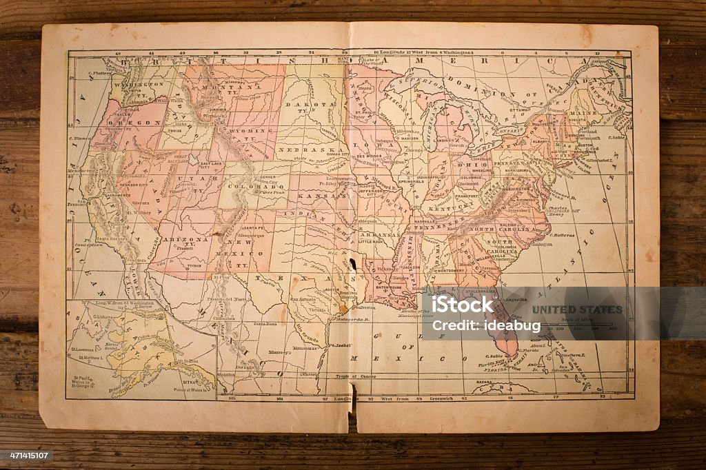 1867, Old, Color Map of United States, Sitting on Wood Color image of an old map of the United States, sitting on wood background, from the 1800's. Map Stock Photo
