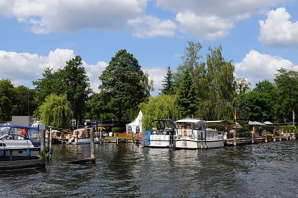 A boat mooring for motorboats on the banks of the Havel River. All kind of motor boats anchoring there. Located in Spandau, Berlin (Germany)See also my other Berlin images: