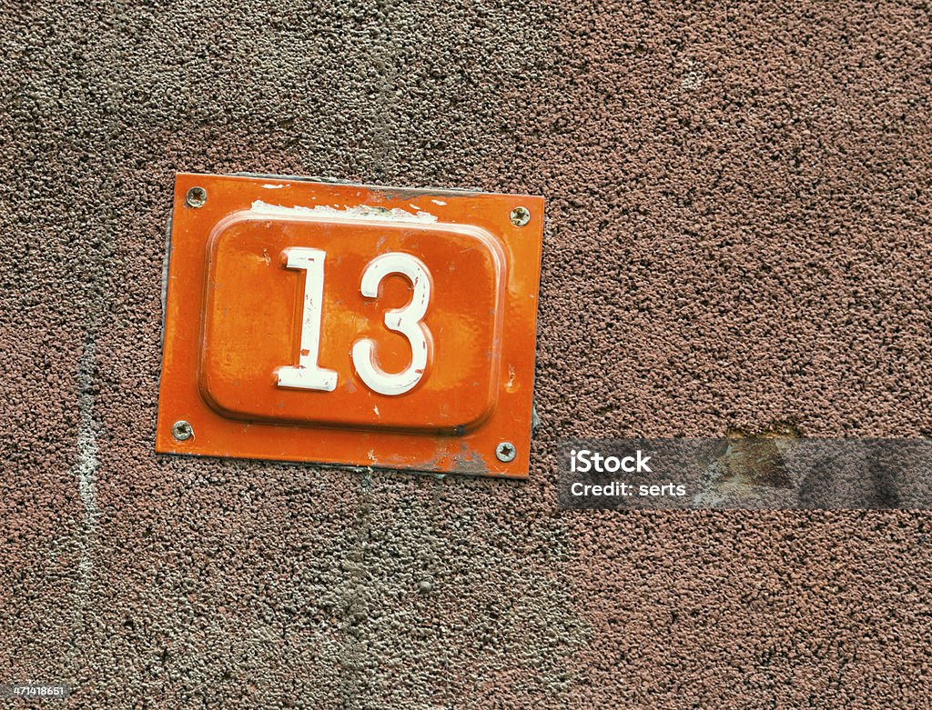 Number 13 House number is thirteen. Lucky 13 Friday the 13th Stock Photo