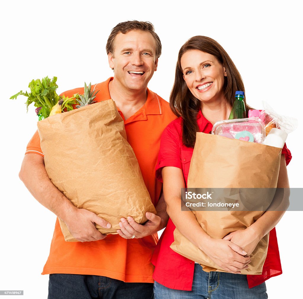 Gerne Älteres Paar mit Lebensmittel-Shopping Taschen-isoliert - Lizenzfrei Supermarkt Stock-Foto