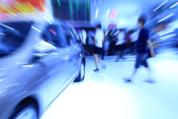 Automobile Exhibition Zoom shot of the car exhibition site, blurred motion and zoom blur car show stock pictures, royalty-free photos & images