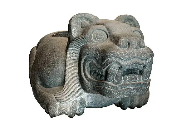 This was an altar-like stone vessel used by the Aztecs to contain human hearts extracted in sacrificial ceremonies. It has a Jaguar incarnation and it is called a Cuauhxicalli.