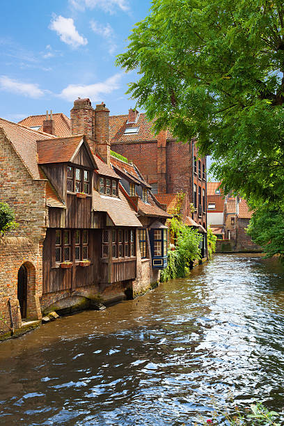 istock Medieval houses along Bruges canal, Belgium 471419650