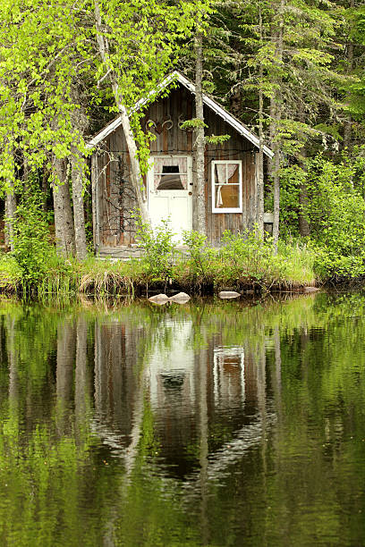 istock little house by the lake 471419955