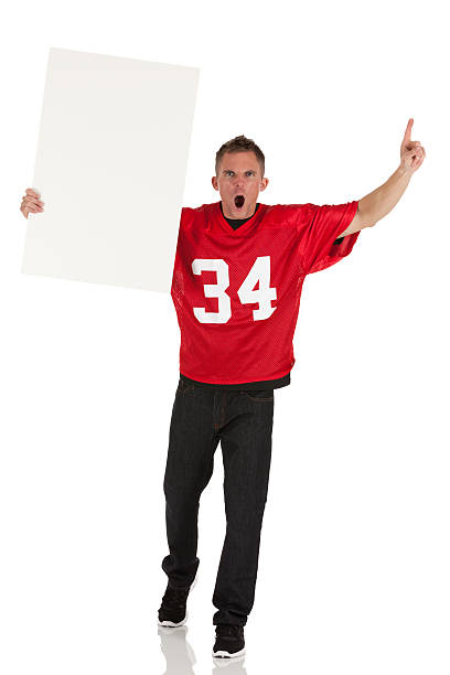 istock Sports fan holding a placard and shouting 471420145