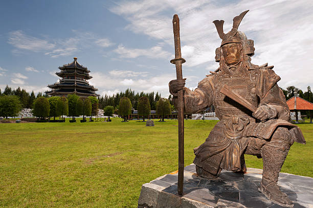 istock Japanese Warrior statue in front of chinese temple 471420329