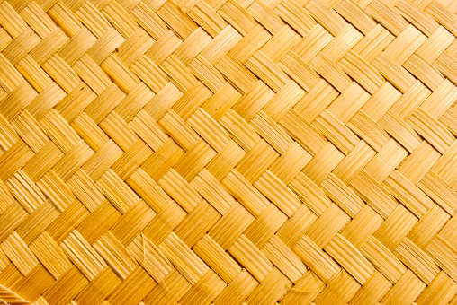 Herring-bone woven reed background.