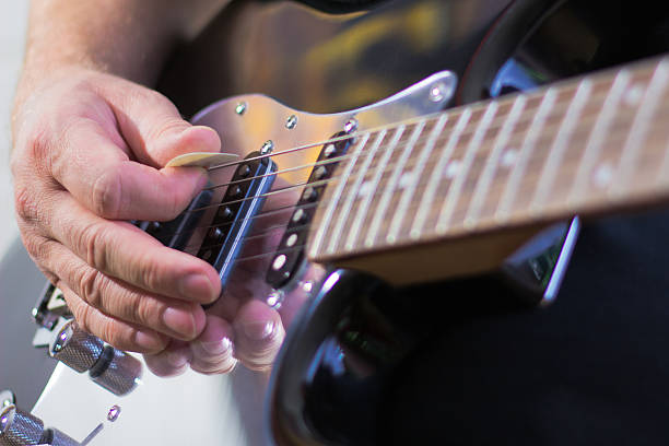 Playing Guitar stock photo