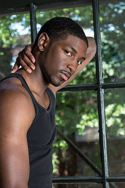 istock Young Male Stares at the Camera 471422471