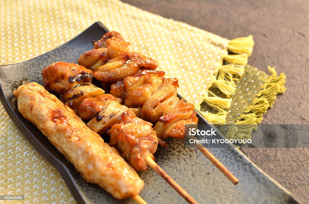 Char-broiled chicken &quot;Yakitori&quot; This is a picture of a char-broiled chicken. One of the most famous dishes of Japan. Called "Yakitori"This is a picture of a char-broiled chicken. One of the most famous dishes of Japan. Called "Yakitori" Barbecue Chicken Stock Photo