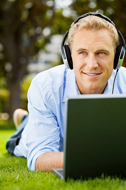 istock Young Man Listening To Music 471425153
