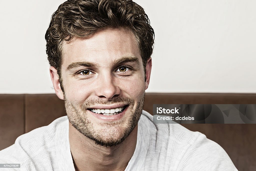 Portrait of Smiling Young Man A smiling young man. 20-29 Years Stock Photo