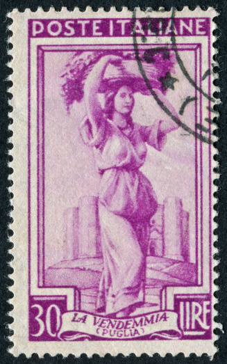 Cancelled Stamp From Italy Featuring The Grape Harvest In Puglia.
