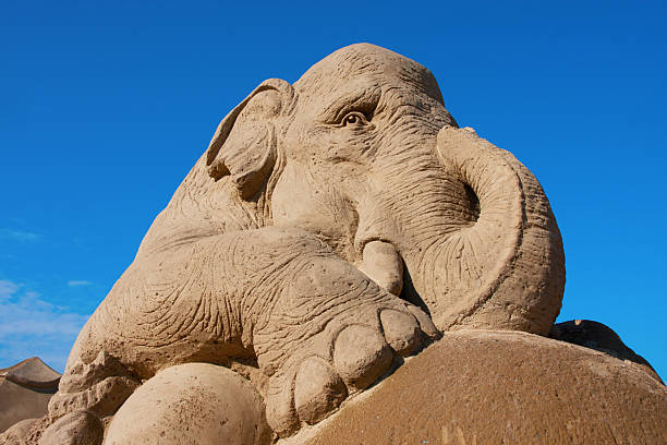 Sand sculpture of elephant In Lappeenranta, Finland, every year there is a festival of making sand sculptures. This beautifull elephant is part of "Circus" theme in summer of 2011. lappeenranta stock pictures, royalty-free photos & images