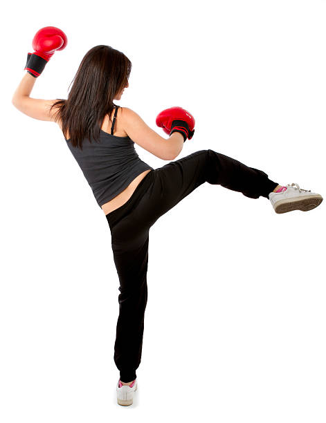 istock woman in kick boxing action 471430561
