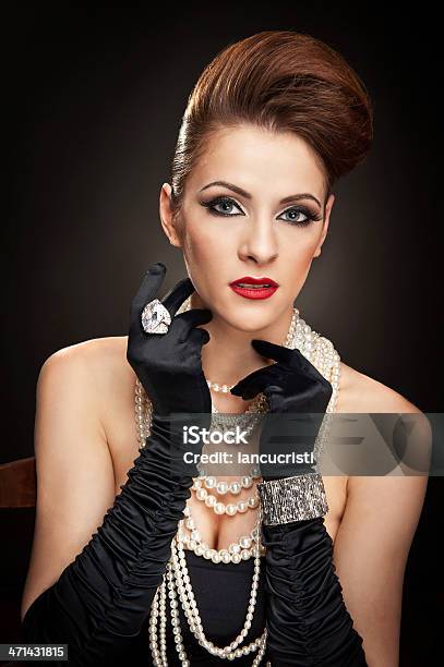 Young Elegant Beautiful Woman In Black Dress And Gloves Stock Photo - Download Image Now