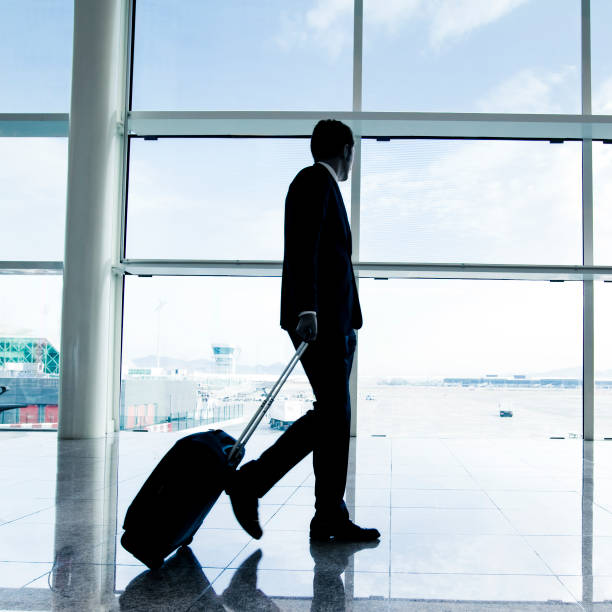 istock Businessman in airport 471433619