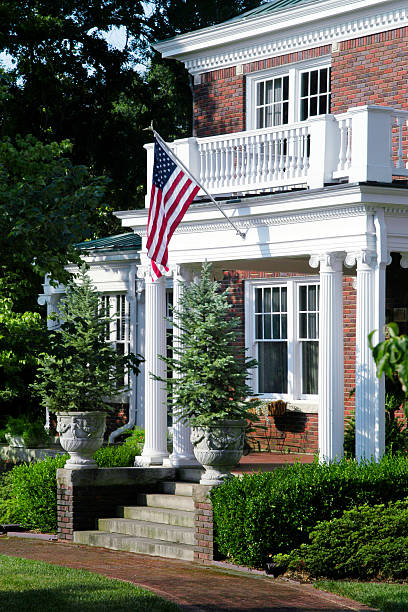 istock Front porch with an American Flag 471434085