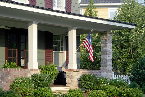 istock Front Porch with an American Flag 471434351