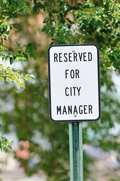 istock Reserved for city manager parking sign 471435849